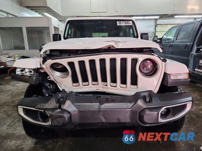 Piąte zdjęcie samochodu w środku: 2021 JEEP WRANGLER UNLIMITED SAHARA VIN:1C4HJXEGXMW764214 - miniatura