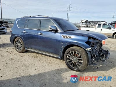 Czwarte zdjęcie samochodu z boku: 2016 INFINITI QX80 VIN:JN8AZ2NE6G9120440 - miniatura