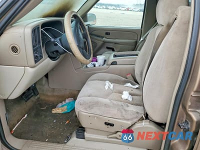 Zdjęcie 7 z 13 samochodu: 2004 CHEVROLET TAHOE C1500 VIN:1GNEC13Z24R112157 - miniatura