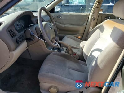 Zdjęcie 7 z 13 samochodu: 2001 MAZDA 626 ES VIN:1YVGF22CX15239215 - miniatura