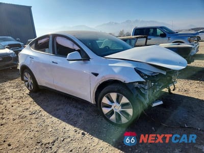 Czwarte zdjęcie samochodu z boku: 2021 TESLA MODEL Y VIN:5YJYGDEE2MF297418 - miniatura