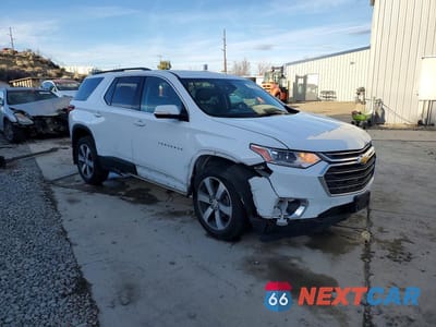 Czwarte zdjęcie samochodu z boku: 2019 CHEVROLET TRAVERSE LT VIN:1GNEVHKW5KJ286083 - miniatura
