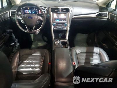 Zdjęcie 8 z 12 samochodu: 2017 FORD FUSION SE HYBRID VIN:3FA6P0LU3HR409289 - miniatura