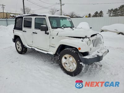 Czwarte zdjęcie samochodu z boku: 2014 JEEP WRANGLER UNLIMITED SAHARA VIN:1C4HJWEG5EL126269 - miniatura