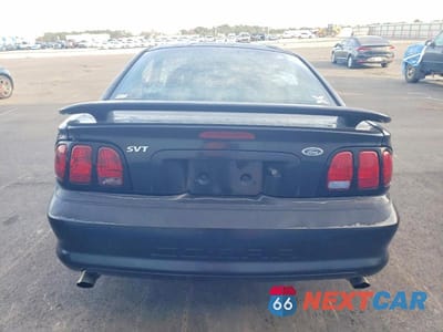 Zdjęcie 6 z 12 samochodu: 1998 FORD MUSTANG COBRA VIN:1FAFP47V4WF163938 - miniatura