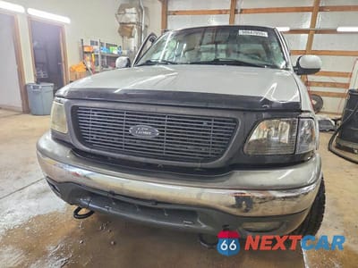 Piąte zdjęcie samochodu w środku: 2003 FORD F150 VIN:2FTRX18L93CA15858 - miniatura