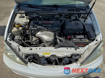 Zdjęcie 7 z 13 samochodu: 2002 TOYOTA CAMRY LE VIN:4T1BE32K52U027812 - miniatura