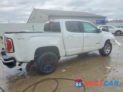 Trzecie zdjęcie samochodu z tyłu: 2022 GMC CANYON ELEVATION VIN:1GTG6CEN1N1321534 - miniatura