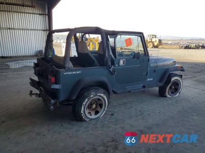 Trzecie zdjęcie samochodu z tyłu: 1993 JEEP WRANGLER VIN:1J4FY29SXPP269556 - miniatura