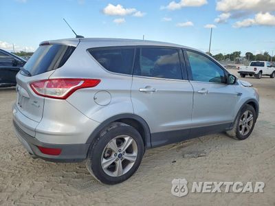 Trzecie zdjęcie samochodu z tyłu: 2016 FORD ESCAPE SE VIN:1FMCU0GX2GUA49767 - miniatura