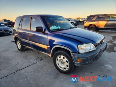 Czwarte zdjęcie samochodu z boku: 1997 HONDA CR-V LX VIN:JHLRD1841VC003300 - miniatura