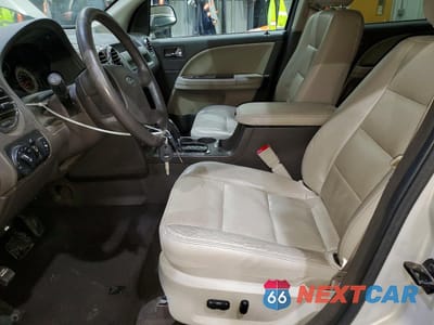 Zdjęcie 7 z 13 samochodu: 2009 FORD TAURUS X LIMITED VIN:1FMDK06WX9GA03124 - miniatura