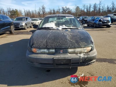Piąte zdjęcie samochodu w środku: 1999 SATURN SL1 VIN:1G8ZH5286XZ291684 - miniatura