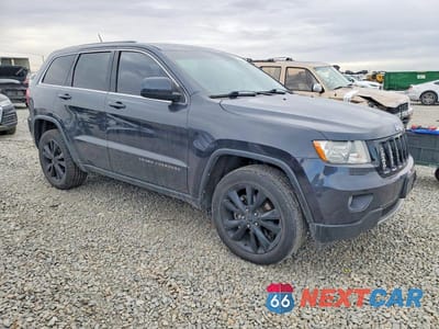 Czwarte zdjęcie samochodu z boku: 2013 JEEP GRAND CHEROKEE LAREDO VIN:1C4RJFAT6DC586790 - miniatura