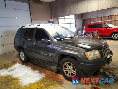 Czwarte zdjęcie samochodu z boku: 2004 JEEP GRAND CHEROKEE LAREDO VIN:1J4GW48S74C128101 - miniatura