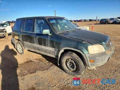 Czwarte zdjęcie samochodu z boku: 1999 HONDA CR-V EX VIN:JHLRD1851XC810492 - miniatura