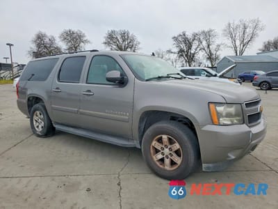Czwarte zdjęcie samochodu z boku: 2007 CHEVROLET SUBURBAN K1500 VIN:1GNFK16387J166953 - miniatura