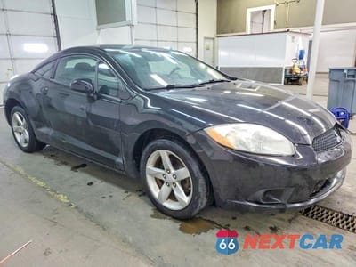 Czwarte zdjęcie samochodu z boku: 2009 MITSUBISHI ECLIPSE GS VIN:4A3AK24F29E025357 - miniatura