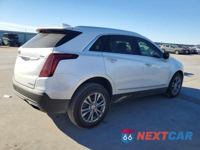 Trzecie zdjęcie samochodu z tyłu: 2021 CADILLAC XT5 PREMIUM LUXURY VIN:1GYKNCRS6MZ235370 - miniatura