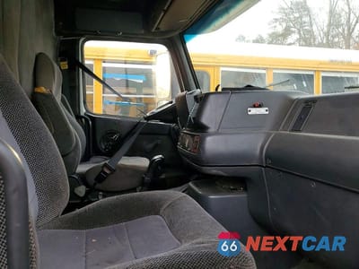 Piąte zdjęcie samochodu w środku: 1999 VOLVO VN SEMI TRUCK VIN:4VG7DEJH6XN766257 - miniatura