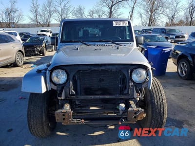 Piąte zdjęcie samochodu w środku: 2016 JEEP WRANGLER SAHARA VIN:1C4AJWBG0GL307823 - miniatura