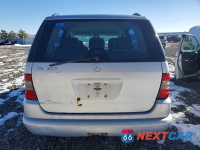 Zdjęcie 6 z 13 samochodu: 2000 MERCEDES-BENZ ML 320 VIN:4JGAB54E6YA210542 - miniatura