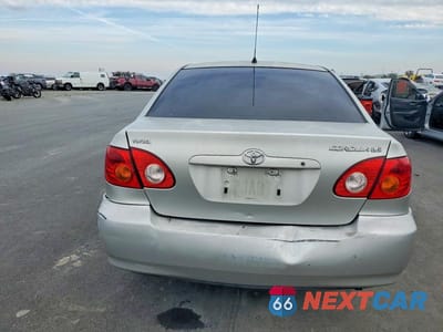 Zdjęcie 6 z 12 samochodu: 2003 TOYOTA COROLLA LE VIN:JTDBR32E030021668 - miniatura