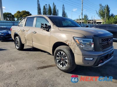 Czwarte zdjęcie samochodu z boku: 2024 NISSAN TITAN PRO-4X VIN:1N6AA1ED9RN104101 - miniatura