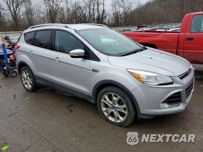 Czwarte zdjęcie samochodu z boku: 2014 FORD ESCAPE TITANIUM VIN:1FMCU9J96EUC65911 - miniatura