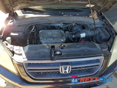 Zdjęcie 12 z 13 samochodu: 2004 HONDA PILOT EXL VIN:2HKYF18664H572490 - miniatura