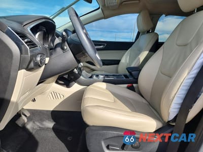Zdjęcie 7 z 14 samochodu: 2021 FORD EDGE TITANIUM VIN:2FMPK3K90MBA18424 - miniatura
