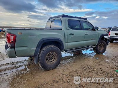 Trzecie zdjęcie samochodu z tyłu: 2023 TOYOTA TACOMA DOUBLE CAB VIN:3TMCZ5AN6PM577195 - miniatura