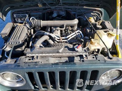 Zdjęcie 12 z 14 samochodu: 2000 JEEP WRANGLER / TJ SAHARA VIN:1J4FA59S6YP772122 - miniatura