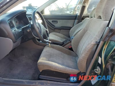 Zdjęcie 7 z 15 samochodu: 2001 SUBARU LEGACY L VIN:4S3BH635617303806 - miniatura