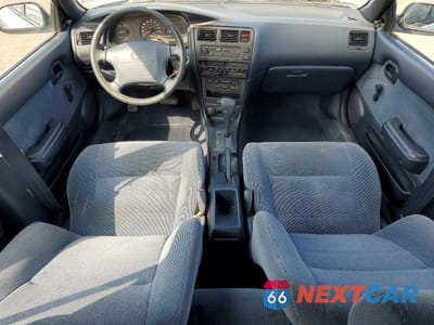 Zdjęcie 8 z 12 samochodu: 1993 TOYOTA COROLLA BASE VIN:JT2AE09WXP0021597 - miniatura