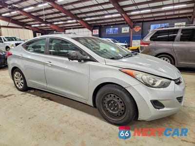 Czwarte zdjęcie samochodu z boku: 2011 HYUNDAI ELANTRA GLS VIN:5NPDH4AE7BH058933 - miniatura