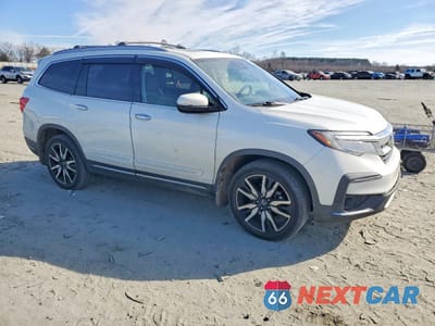 Czwarte zdjęcie samochodu z boku: 2021 HONDA PILOT ELITE VIN:5FNYF6H03MB086873 - miniatura