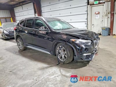 Czwarte zdjęcie samochodu z boku: 2016 BMW X1 XDRIVE28I VIN:WBXHT3C32GP884450 - miniatura