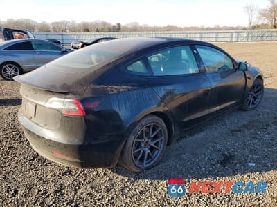 Trzecie zdjęcie samochodu z tyłu: 2022 TESLA MODEL 3 VIN:5YJ3E1EA1NF102776 - miniatura