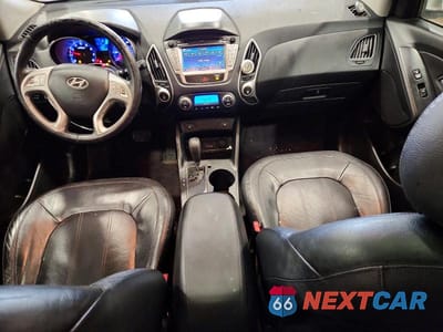 Zdjęcie 8 z 12 samochodu: 2010 HYUNDAI TUCSON VIN:KM8JUCAC8AU047186 - miniatura