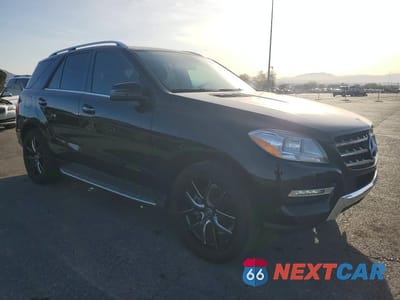 Czwarte zdjęcie samochodu z boku: 2015 MERCEDES-BENZ ML 350 VIN:4JGDA5JB0FA619174 - miniatura