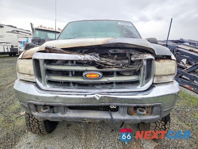 Piąte zdjęcie samochodu w środku: 1999 FORD F350 SUPER DUTY FLATBED TRUCK VIN:1FTSW31F4XED93400 - miniatura