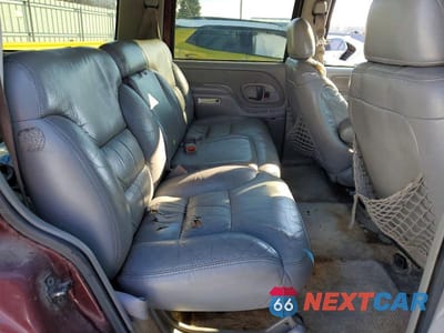 Zdjęcie 11 z 12 samochodu: 1999 CHEV TAHOE K1500 VIN:1GNEK13R3XJ365297 - miniatura