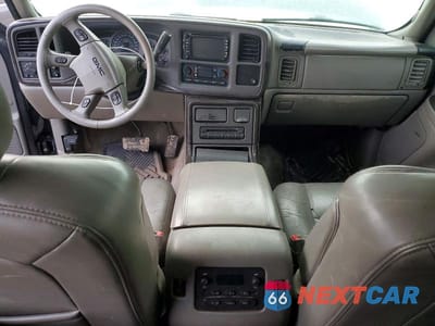 Zdjęcie 8 z 12 samochodu: 2004 GMC YUKON XL VIN:1GKFK66U64J275572 - miniatura