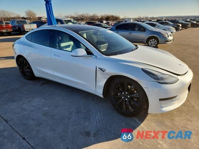 Czwarte zdjęcie samochodu z boku: 2019 TESLA MODEL 3 VIN:5YJ3E1EA3KF486779 - miniatura