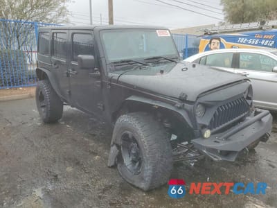 Czwarte zdjęcie samochodu z boku: 2018 JEEP WRANGLER UNLIMITED SPORT VIN:1C4BJWDG5JL874473 - miniatura