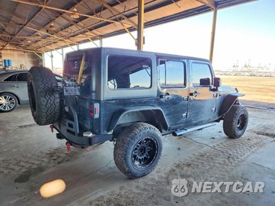 Trzecie zdjęcie samochodu z tyłu: 2011 JEEP WRANGLER UNLIMITED SPORT VIN:1J4BA3H12BL568461 - miniatura
