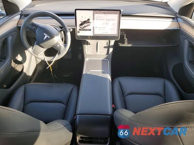Zdjęcie 8 z 11 samochodu: 2024 TESLA MODEL Y VIN:7SAYGDEE6RA228190 - miniatura