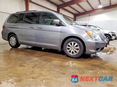 Czwarte zdjęcie samochodu z boku: 2010 HONDA ODYSSEY EXL VIN:5FNRL3H79AB084453 - miniatura