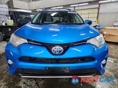 Piąte zdjęcie samochodu w środku: 2018 TOYOTA RAV4 HYBRID XLE VIN:JTMRJREV6JD231721 - miniatura